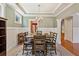 Elegant dining room with a chandelier, decorative rug, and seating for six at 2185 Creole Cir, Cumming, GA 30040