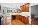 Well-equipped kitchen with granite countertops, stainless steel appliances, and hardwood floors at 2185 Creole Cir, Cumming, GA 30040