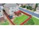 Aerial view of a fenced backyard with a trampoline, a deck and a nice lawn at 2425 Delamore Chase, Duluth, GA 30097