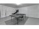 Spacious unfinished basement featuring ping pong table and basketball hoop at 2425 Delamore Chase, Duluth, GA 30097