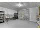 Finished basement with storage, a work space, and unique wall decor at 2425 Delamore Chase, Duluth, GA 30097