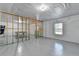 Unfinished basement space with exposed framing, a ping pong table and ample room for customization at 2425 Delamore Chase, Duluth, GA 30097