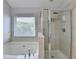 Bathroom with tub, shower and window offering abundant natural lighting at 2425 Delamore Chase, Duluth, GA 30097