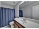 Bathroom has a mirror over the sink and a shower curtain at 2425 Delamore Chase, Duluth, GA 30097