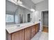 Bathroom featuring a dual vanity, bright lighting, and tile floors at 2425 Delamore Chase, Duluth, GA 30097