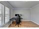 Bedroom with LED lighting features a desk, chair and large window at 2425 Delamore Chase, Duluth, GA 30097