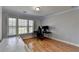 Bedroom features a desk, chair, and large window for ample natural light at 2425 Delamore Chase, Duluth, GA 30097