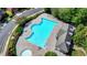 Aerial view of a large community pool, featuring an irregular shape and ample seating at 2425 Delamore Chase, Duluth, GA 30097