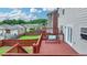 Outdoor deck with a porch swing and a view of the backyard and fence at 2425 Delamore Chase, Duluth, GA 30097