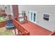 Spacious wooden deck with a swing chair, perfect for outdoor relaxation and entertaining at 2425 Delamore Chase, Duluth, GA 30097