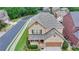 Attractive two-story brick home featuring a covered front porch and well-manicured landscaping at 2425 Delamore Chase, Duluth, GA 30097