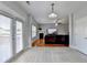 Open-concept living area with sliding glass doors and lots of natural light at 2425 Delamore Chase, Duluth, GA 30097