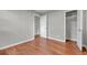 Cozy bedroom with hardwood floors, closet, and neutral paint at 3395 Spring Dr, Atlanta, GA 30360