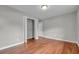 Bedroom featuring hardwood floors, and a closet at 3395 Spring Dr, Atlanta, GA 30360