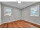 Bedroom with hardwood floors and two windows at 3395 Spring Dr, Atlanta, GA 30360