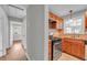 Traditional kitchen featuring stainless steel appliances, wood cabinets, and neutral countertops at 3395 Spring Dr, Atlanta, GA 30360