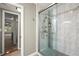 Modern bathroom featuring a glass-enclosed shower, tile walls, and a sleek design for a luxurious feel at 3999 Brintons Ml, Marietta, GA 30062