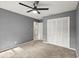 Neutral bedroom features a large closet and adjoining bath at 3999 Brintons Ml, Marietta, GA 30062