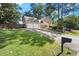 Charming two-story home with a two-car garage, brick accents, and a well-manicured front yard at 3999 Brintons Ml, Marietta, GA 30062