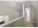 Upstairs hallway leads to bedrooms and bath at 3999 Brintons Ml, Marietta, GA 30062