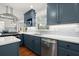 Beautiful kitchen with blue cabinets, stainless steel appliances, and subway tile backsplash at 3999 Brintons Ml, Marietta, GA 30062