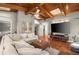 Bright living room features hardwood floors, beamed ceilings and lots of sunlight at 3999 Brintons Ml, Marietta, GA 30062