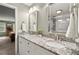 Elegant main bathroom featuring dual sinks, granite countertops, and a separate tiled shower for a spa-like experience at 3999 Brintons Ml, Marietta, GA 30062