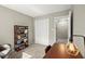 This office space is the perfect work-from-home setup, featuring a desk, bookcase, and chair at 3999 Brintons Ml, Marietta, GA 30062