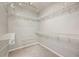 Walk-in closet features wire shelving and plush carpet at 8650 Hope Mews Ct, Sandy Springs, GA 30350