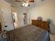 Bedroom featuring a ceiling fan, and ensuite access, providing convenience and comfort at 2123 Floral Ridge Dr, Dacula, GA 30019