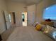 Comfortable bedroom with plush pillows and view to other parts of the home at 2123 Floral Ridge Dr, Dacula, GA 30019