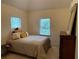 Cozy bedroom with natural light and stylish furnishings at 2123 Floral Ridge Dr, Dacula, GA 30019