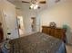 Elegant bedroom showcasing view to other rooms and vaulted ceiling at 2123 Floral Ridge Dr, Dacula, GA 30019
