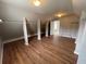 Large, custom walk-in closet with hardwood floors and built in shelving at 2123 Floral Ridge Dr, Dacula, GA 30019