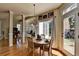 Charming dining area filled with light with views of the outside from every angle at 2123 Floral Ridge Dr, Dacula, GA 30019