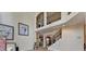 Grand foyer with soaring ceilings, an elegant staircase, and decorative artwork at 2123 Floral Ridge Dr, Dacula, GA 30019