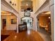 Grand foyer with hardwood floors, ornate archways, and elegant trim work throughout the space at 2123 Floral Ridge Dr, Dacula, GA 30019