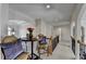 Open hallway with arched doorways and wrought iron banister at 2123 Floral Ridge Dr, Dacula, GA 30019