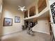 Large living room with high ceilings, a ceiling fan, staircase and beautiful decor, providing an open space at 2123 Floral Ridge Dr, Dacula, GA 30019