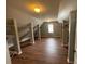 Big walk-in closet featuring hardwood floors and custom storage solutions at 2123 Floral Ridge Dr, Dacula, GA 30019