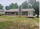 Home featuring an outdoor wood deck and vinyl siding at 2645 Trotters Walk Trl, Snellville, GA 30078