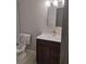 Bathroom with a dark wood vanity with drawers and a white countertop at 2645 Trotters Walk Trl, Snellville, GA 30078