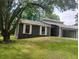 Well-maintained home with a new gray vinyl siding and a large green front yard at 2645 Trotters Walk Trl, Snellville, GA 30078