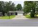 Charming single-Gathering home featuring a driveway and a well-maintained front lawn at 2645 Trotters Walk Trl, Snellville, GA 30078