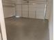 Garage with white door at 2645 Trotters Walk Trl, Snellville, GA 30078