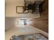 Hallway with wood flooring, neutral walls, and decorative mirror and console table at 4265 Sw Notting Hill Sw Dr, Atlanta, GA 30331