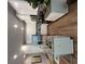 Modern kitchen featuring white cabinets, granite countertops, stainless steel appliances and a central island at 4265 Sw Notting Hill Sw Dr, Atlanta, GA 30331