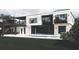 Modern home featuring an open-air patio, pool, and expansive windows for scenic views and relaxation at 654 Longleaf Dr, Atlanta, GA 30342
