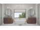 Modern bathroom with double vanities, standalone tub and round mirrors at 654 Longleaf Dr, Atlanta, GA 30342