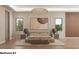 Bright bedroom with neutral decor, ambient lighting, and two large windows at 654 Longleaf Dr, Atlanta, GA 30342